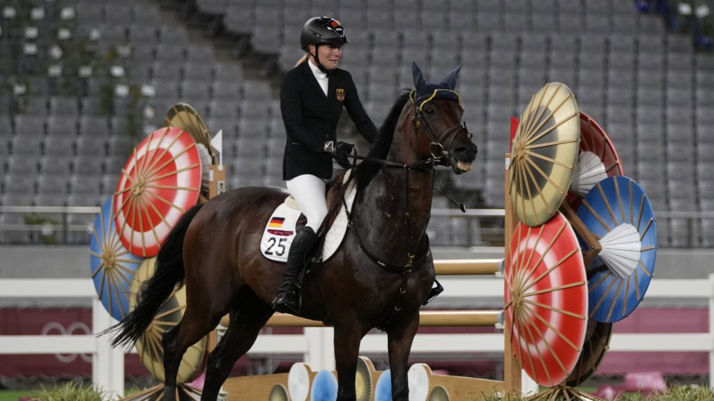 German Coach Kicked Out of Tokyo Olympics After She Punched A Horse – NPR